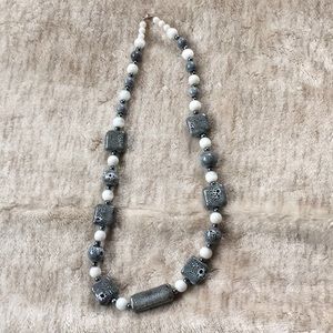 Black and white beads with white tigers eye necklace.